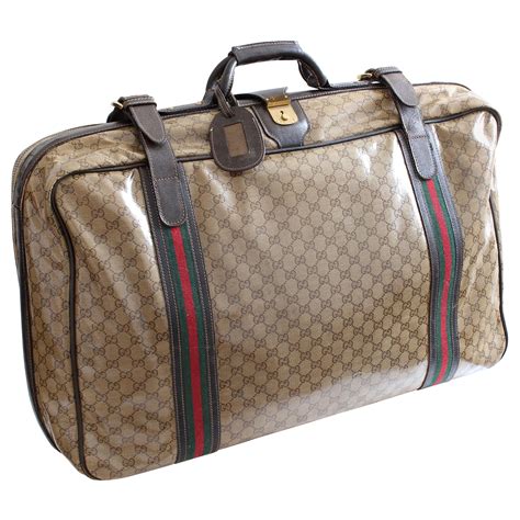 stemma gucci|Gucci leather suitcase.